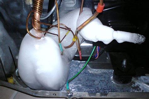 Freon Leaking from Fridge: Essential Repair & Safety。